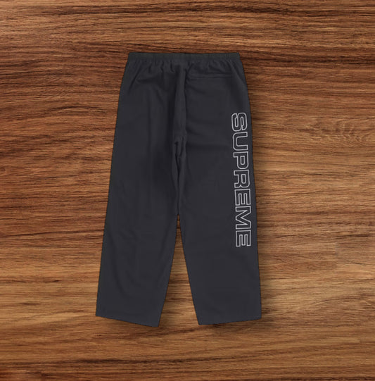 Supreme Black Spellout Embroidered Track Pants